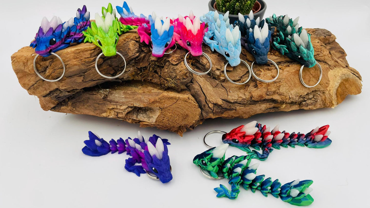 Flexi Edelsteindrachen – Leuchtende 3D-Druck-Schlüsselanhänger in Edelsteinoptik
