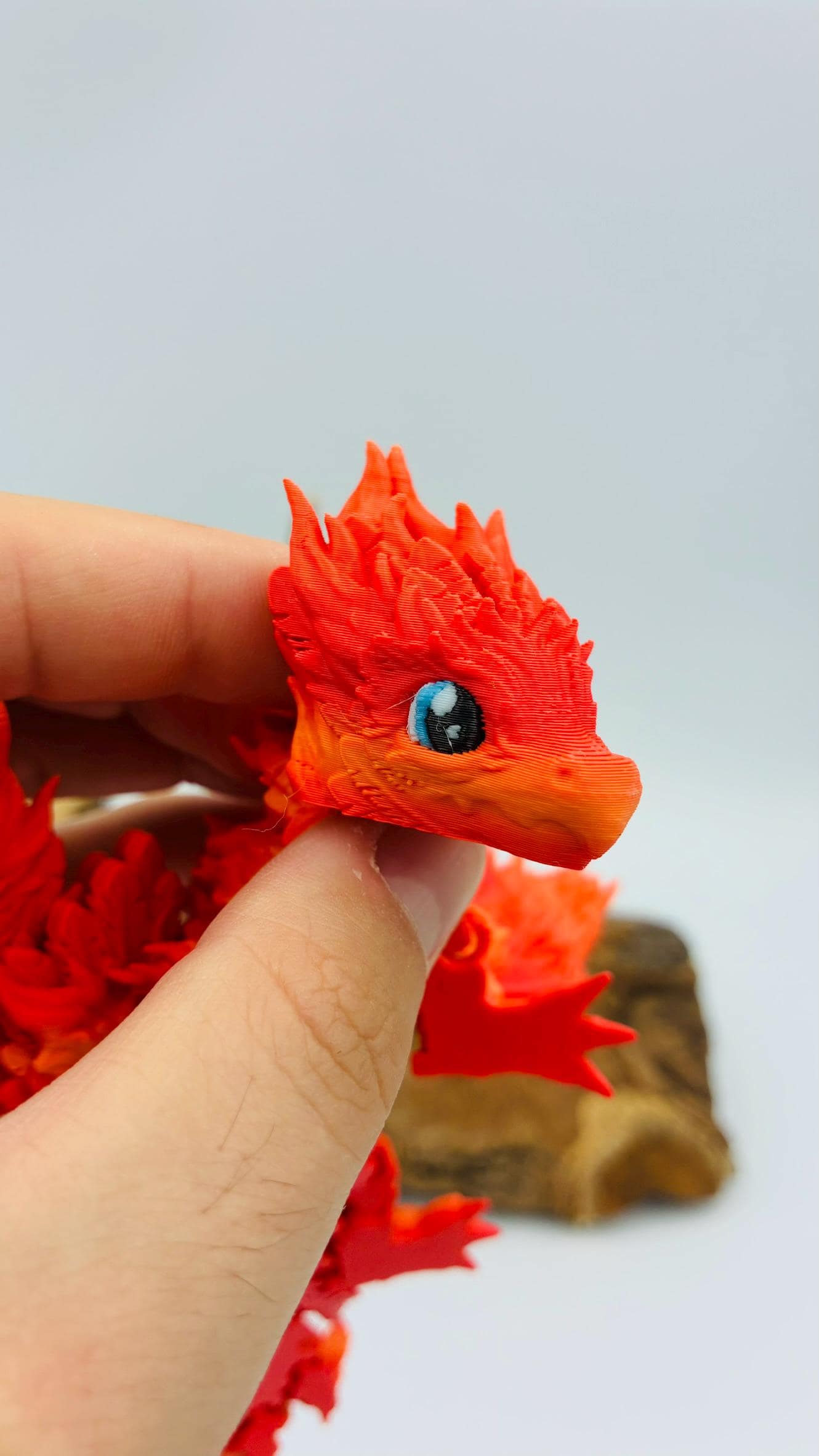 Baby Phönix Drache – 3D-gedruckt | Beweglich | Rot-Gold Farbverlauf | Blaue Augen | Matt oder Glänzend
