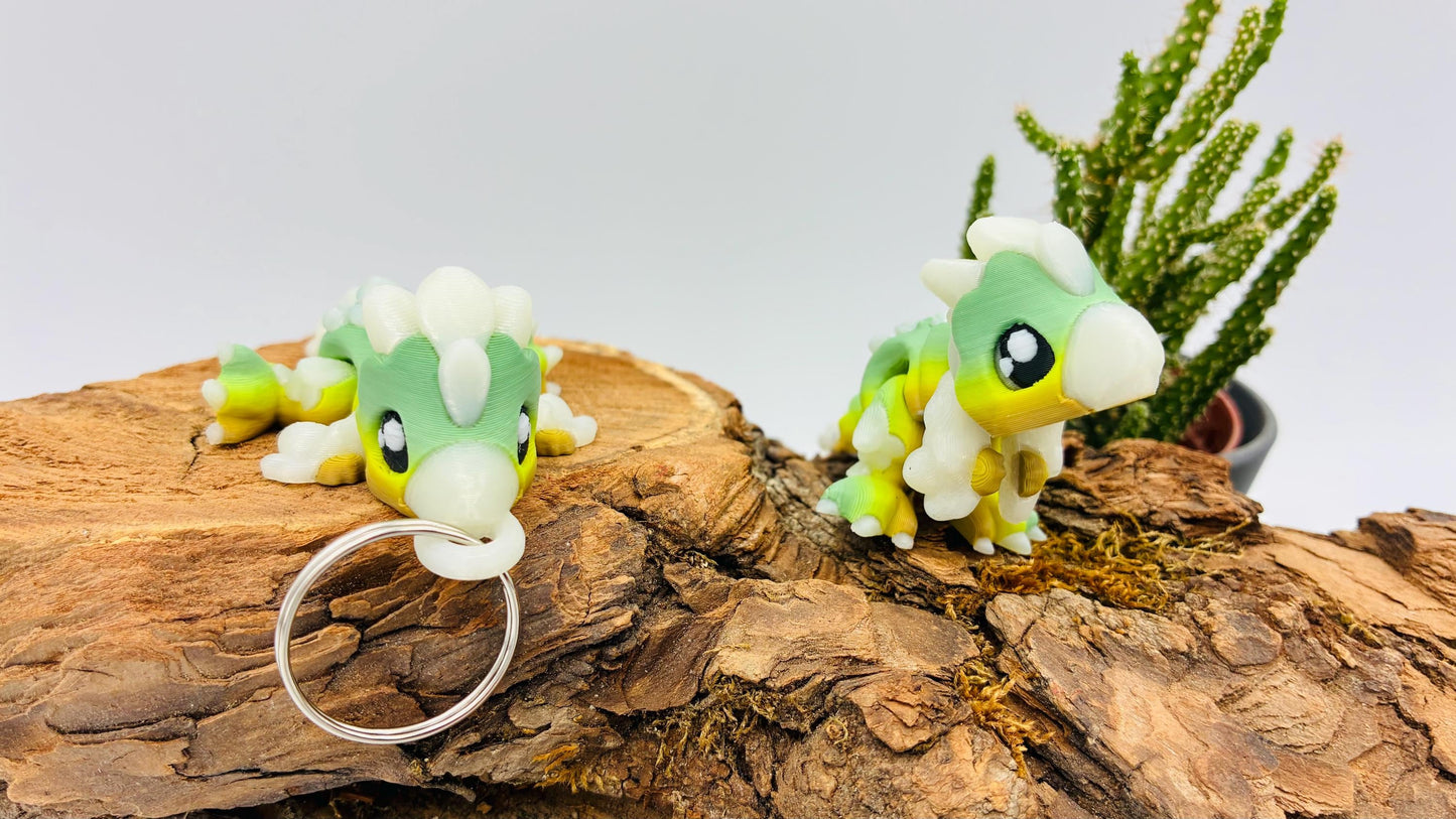 Flexi Mini Velociraptor – 3D-gedruckt | Optional als Schlüsselanhänger | Nachtleuchtend | Matcha Farben