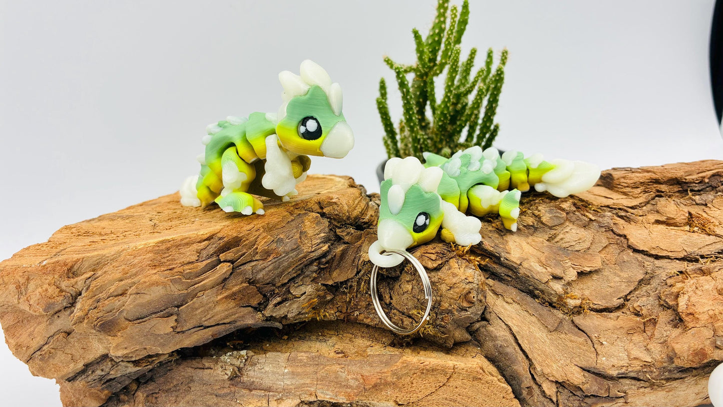 Flexi Mini Velociraptor – 3D-gedruckt | Optional als Schlüsselanhänger | Nachtleuchtend | Matcha Farben